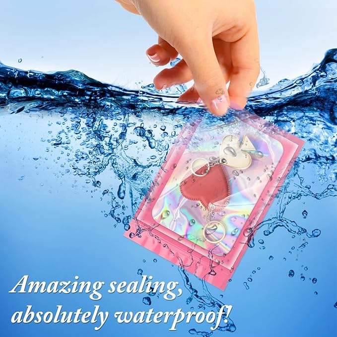 ANZNKU 100 Pack Mylar Bags Reasealable Holographic Bags, Smell Proof Bag Zipper Pouches with Clear Window, Jewelry Candy Sealable Bag for Packaging Sample Party Favor (Pink, 7.1 x 10.2 Inch)